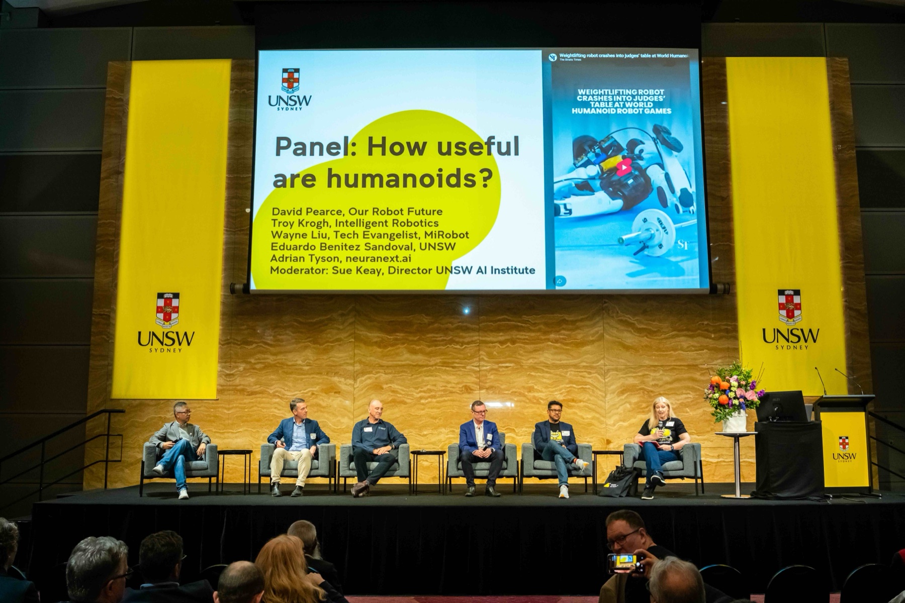 Adrian Tyson speaking on a panel about humanoid robots at UNSW Sydney